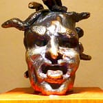 GORGO MEDUSA - Tilmann Krumrey, 2006 GORGO MEDUSA - Elektron 576 (gold-silver-alloy), 251 g, from series of grotesque heads 5.5 cm x 5.5 cm x 5.0 cm - Tilmann Krumrey, 2006